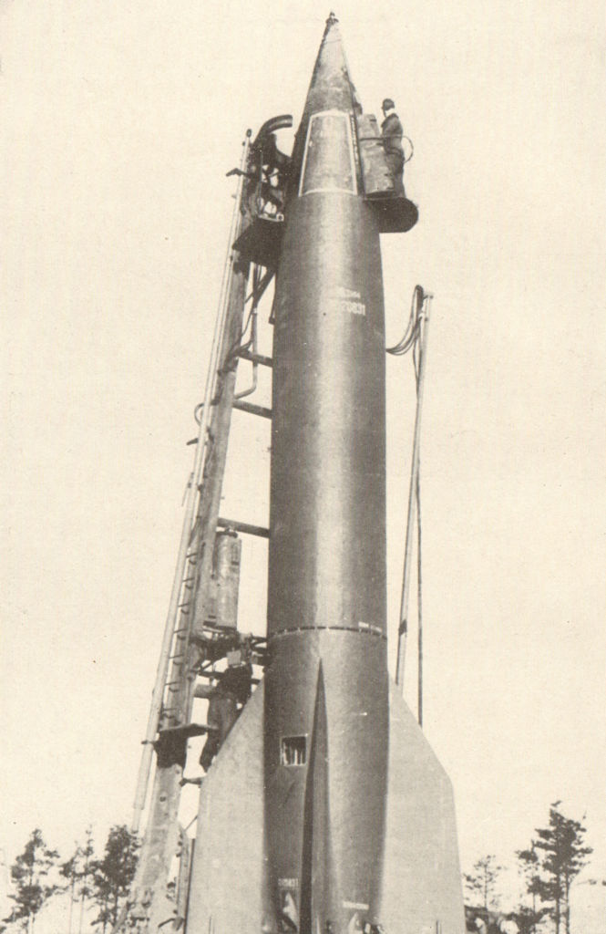 A German V2 rocket being prepared for launching. World War 2 1954 old print