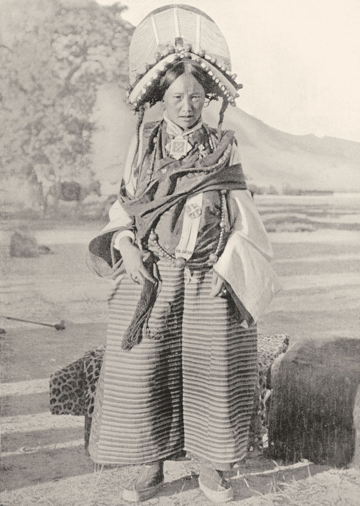 TIBET. A Woman of western Tibet; head-dress pearls coral turquoise 1900 print