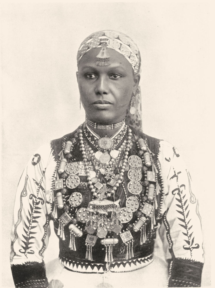 ETHIOPIA. Abyssinia. An Abyssinian Woman;embroidered silk shirt & jewellery 1900