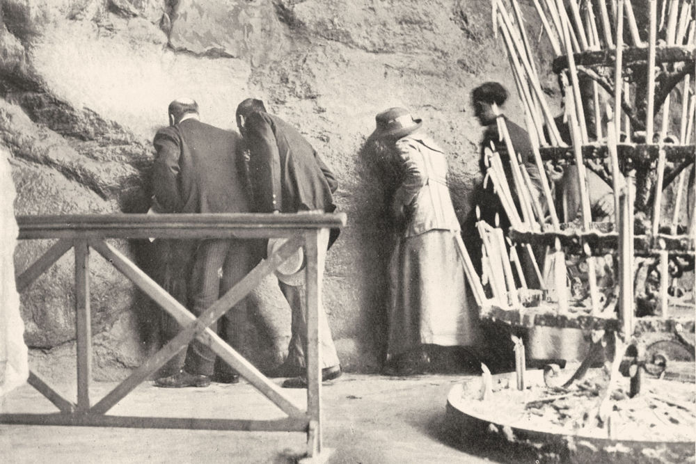 Associate Product HAUTES-PYRÉNÉES. France. The Grotto, Lourdes; Pilgrims kiss the holy stone 1900