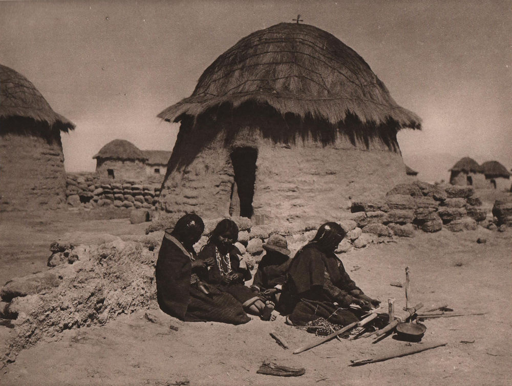Chipaya Indians in front of their house in Carangas Province. Bolivia 1928