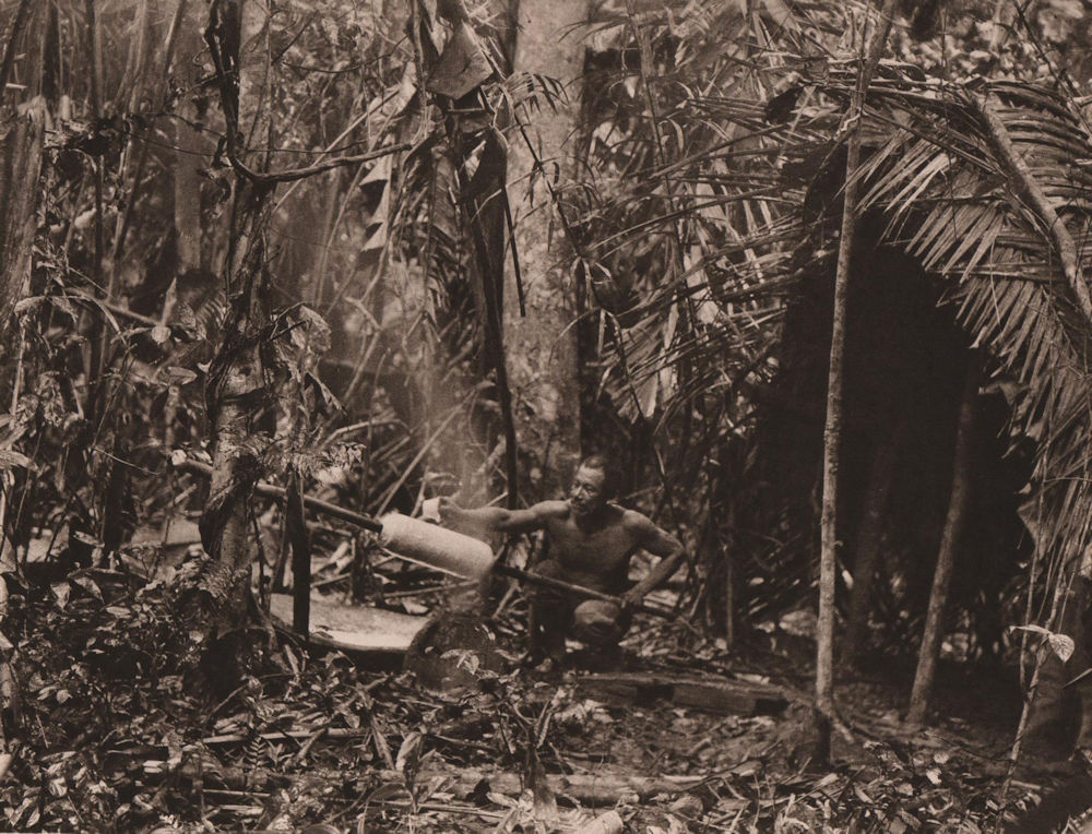 Workman, Cavines forest smoking rubber. Chonta palm nuts. Bolivia 1928 print