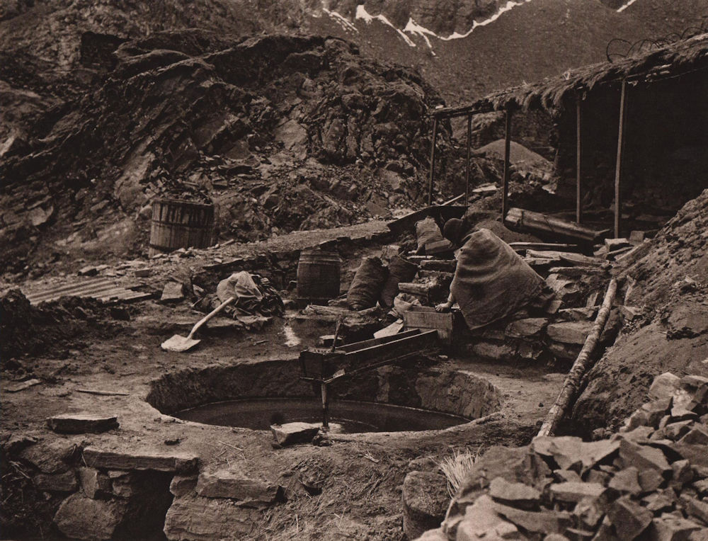 Indian women washing out tin in one of the Araca group mines. Bolivia 1928